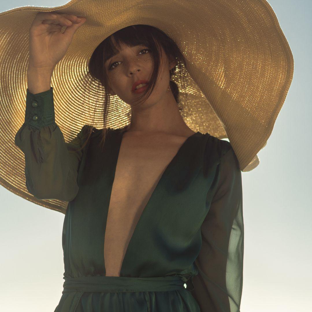 woman with sun head in a sunny location