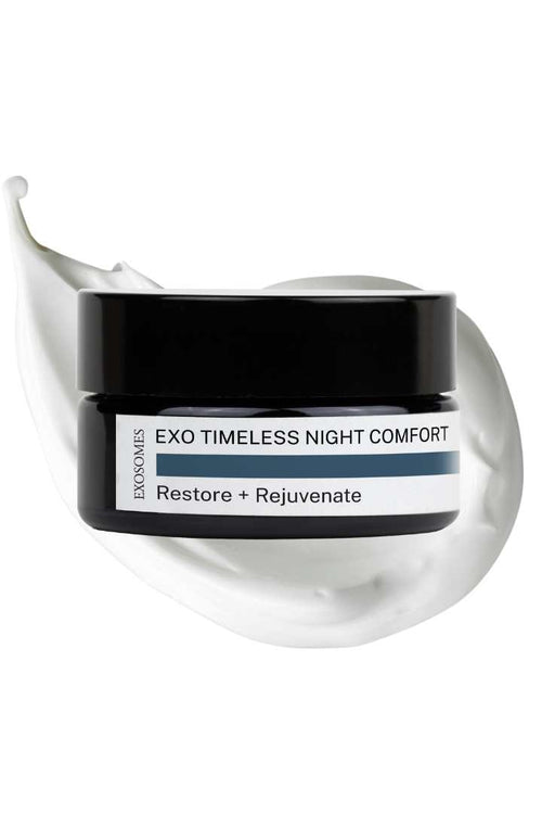 A jar of EXOSOMES Exo Timeless Night Comfort cream with a white cream swirl around it, indicating the product's hydrating and firming properties.